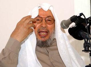 Al Qardaoui, chef spirituel international des organisations islamo-terroristes que la Bachaghas Khalida Toumi a ramené pour une conférence à Tizi-Ouzou, en 2007, à la maison de la culture Mouloud Mammeri, par l’intermédiaire de son complice, l’autre Bachaghas, Ould Ali-Lhadi.