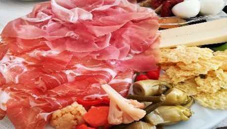 Gusto friulano: tra prosciutto, arte e frico