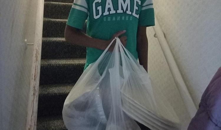 Service user receives donations to the door