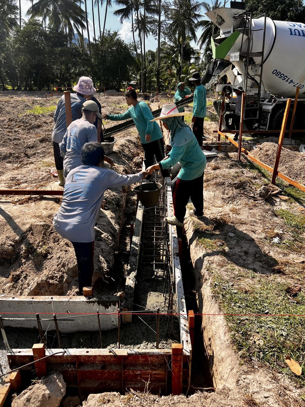 Pose de la Première Ceinture de Fondation Pose de la Première Ceinture de Fondation