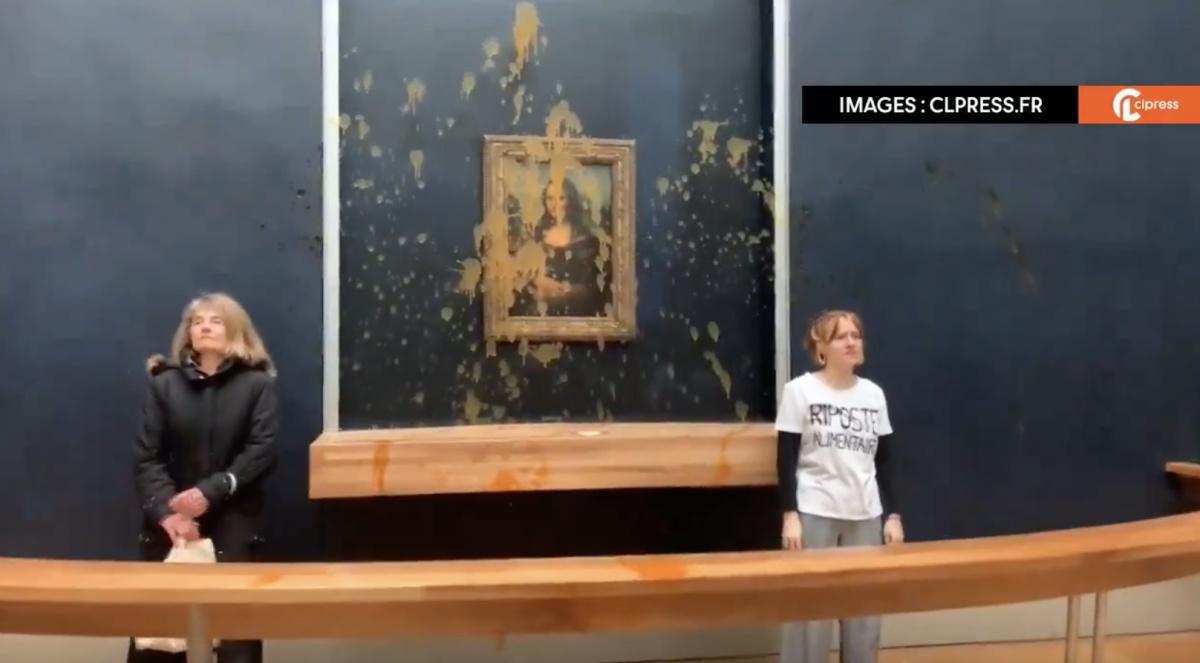 Vidéo. Des écologistes ont versé de la soupe sur "La Joconde" Vidéo. Des écologistes ont versé de la soupe sur "La Joconde"