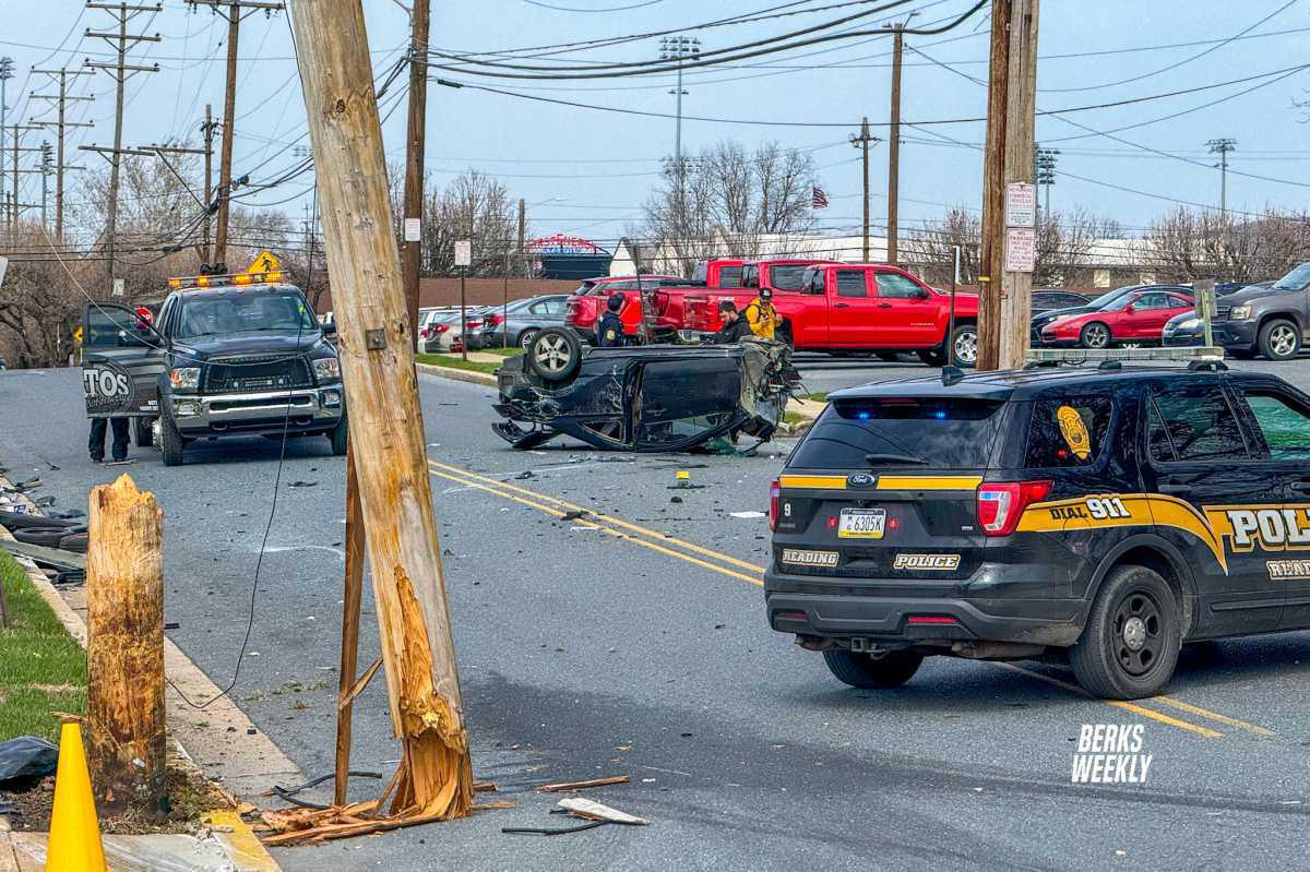 Reading: Vehicle into Utility Pole, Split in Half