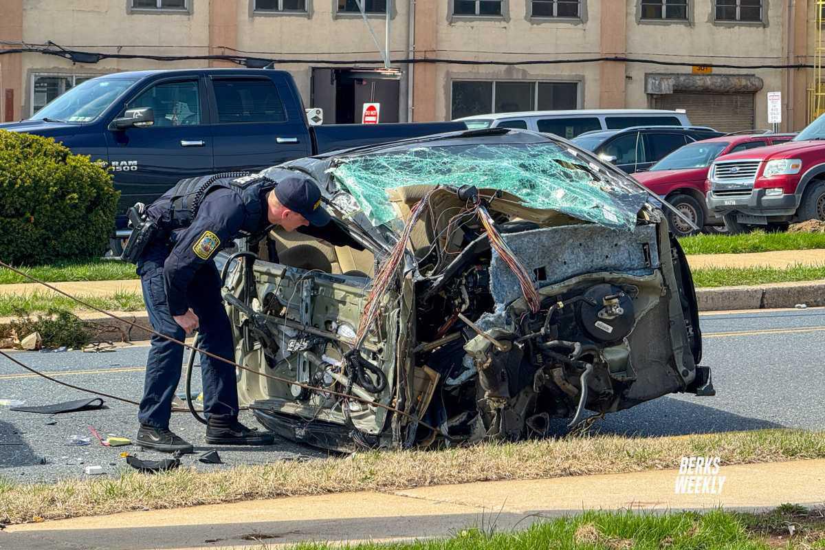 Reading: Vehicle into Utility Pole, Split in Half