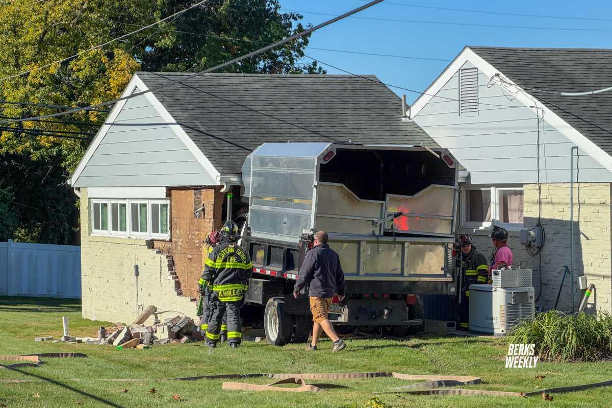 Sinking Spring: Dump Truck into House