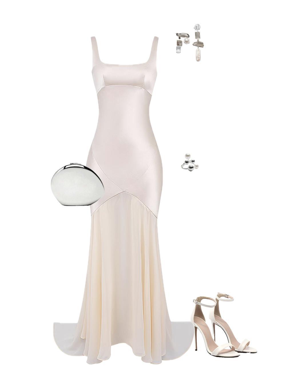 An outfit featuring an elegant dress with an accentuated sheer hemline