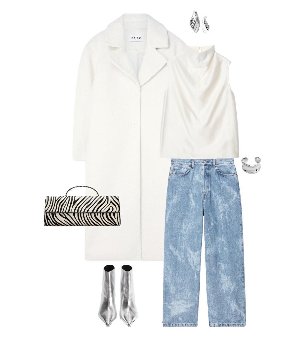 An outfit featuring a draped top paired with statement jeans