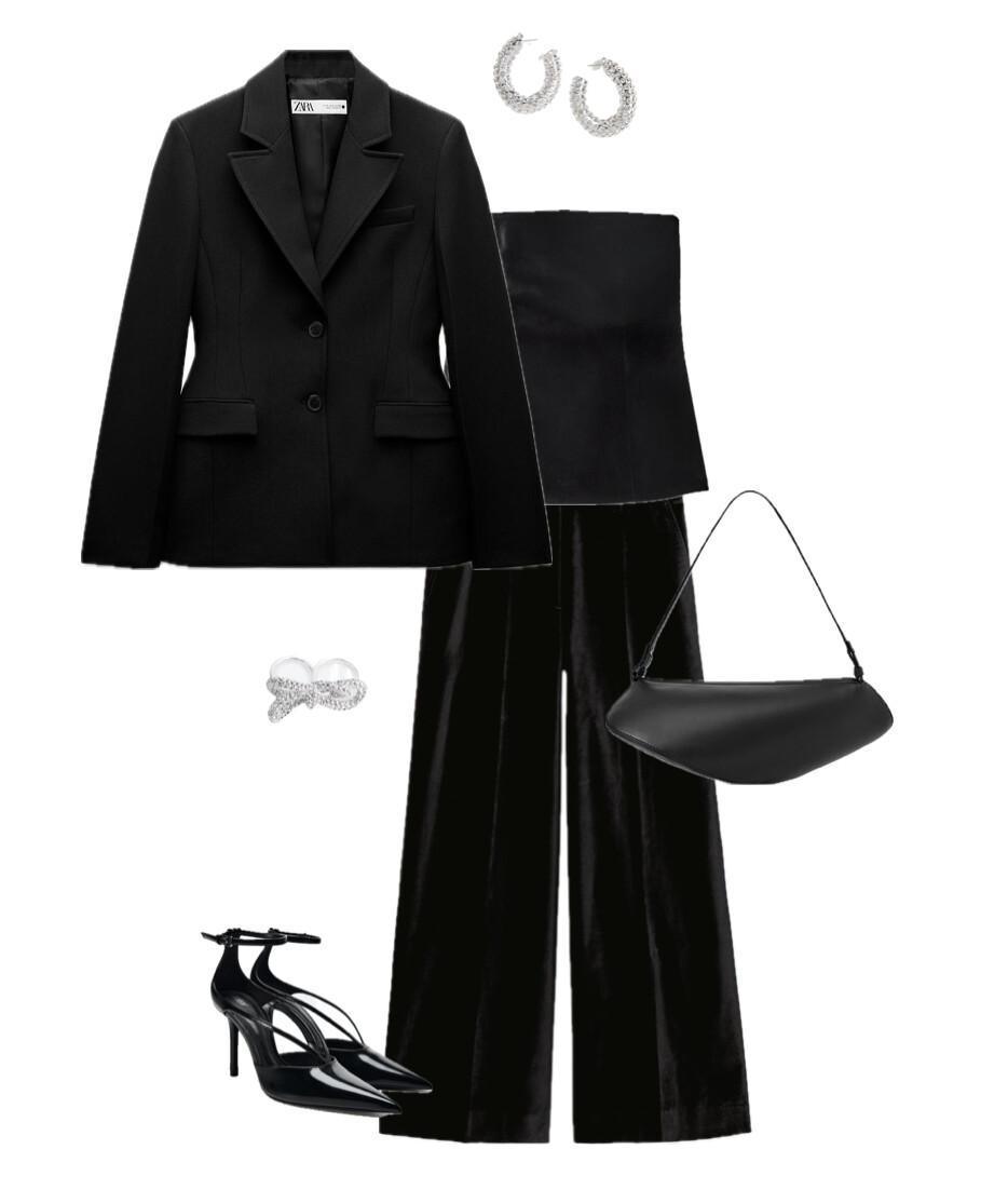 An outfit featuring a black velvet suit with crystal accents