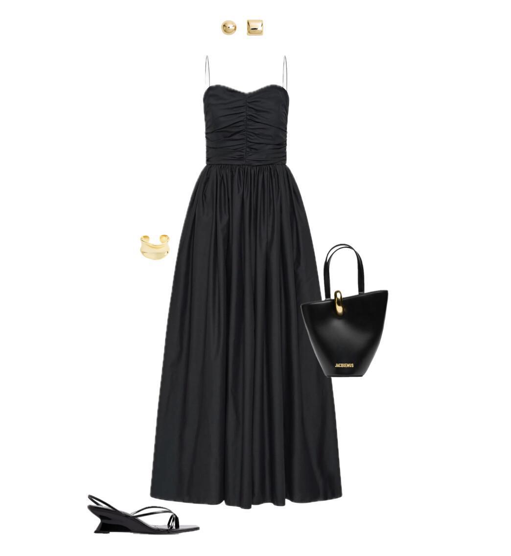 An outfit featuring a black draped dress paired with a statement bag