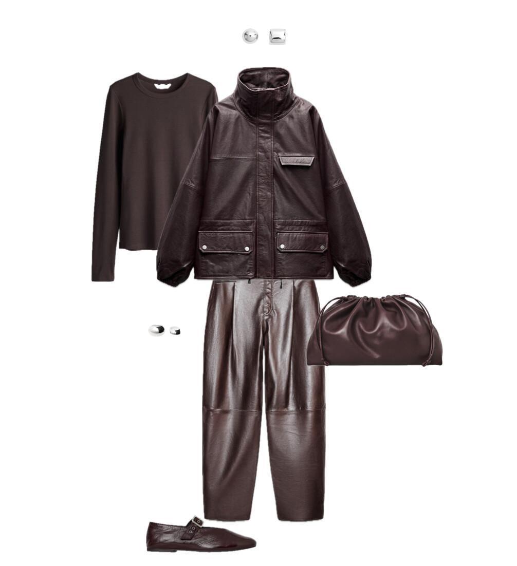 The outfit is monochrome with a leather suit in burgundy color