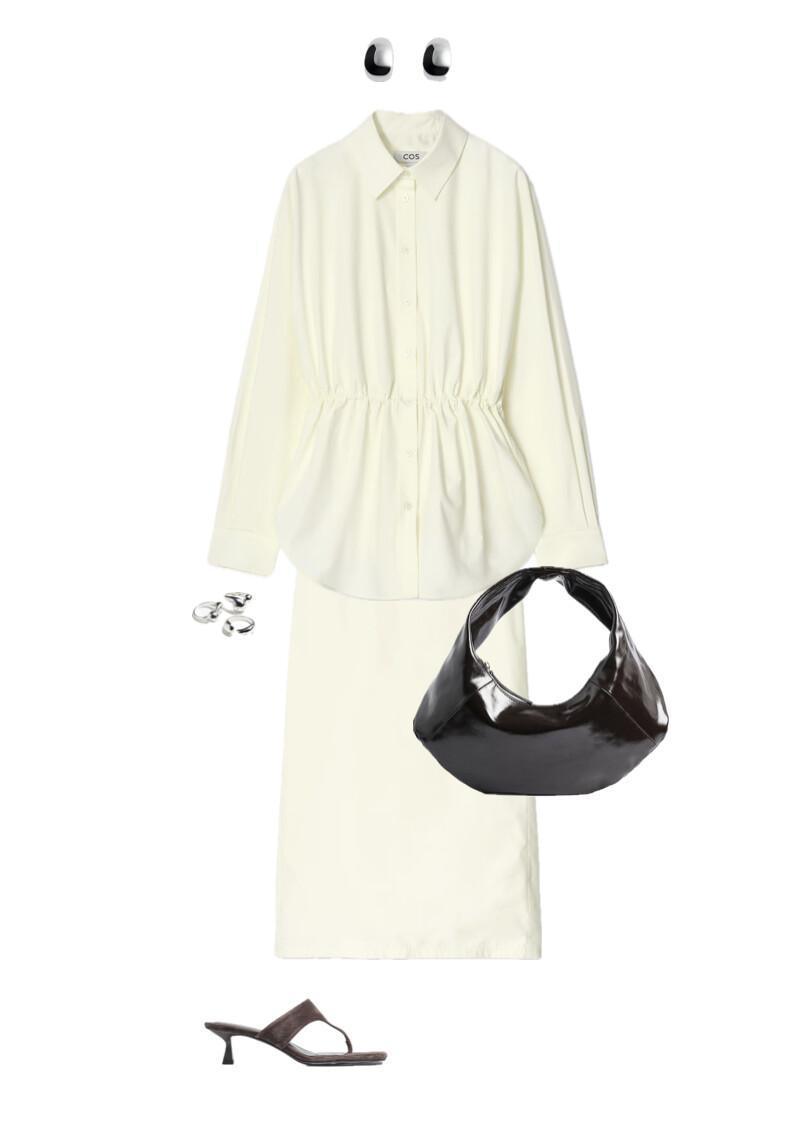 An outfit with a suit in a trendy color and a patent leather bag