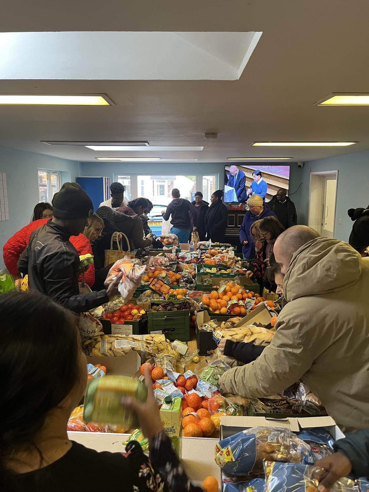 Service user collecting donating items