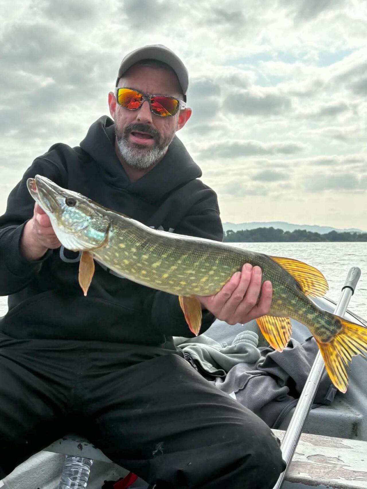 small pike from loch leven in Scotland caught using Livingston lure menace 🏴______
