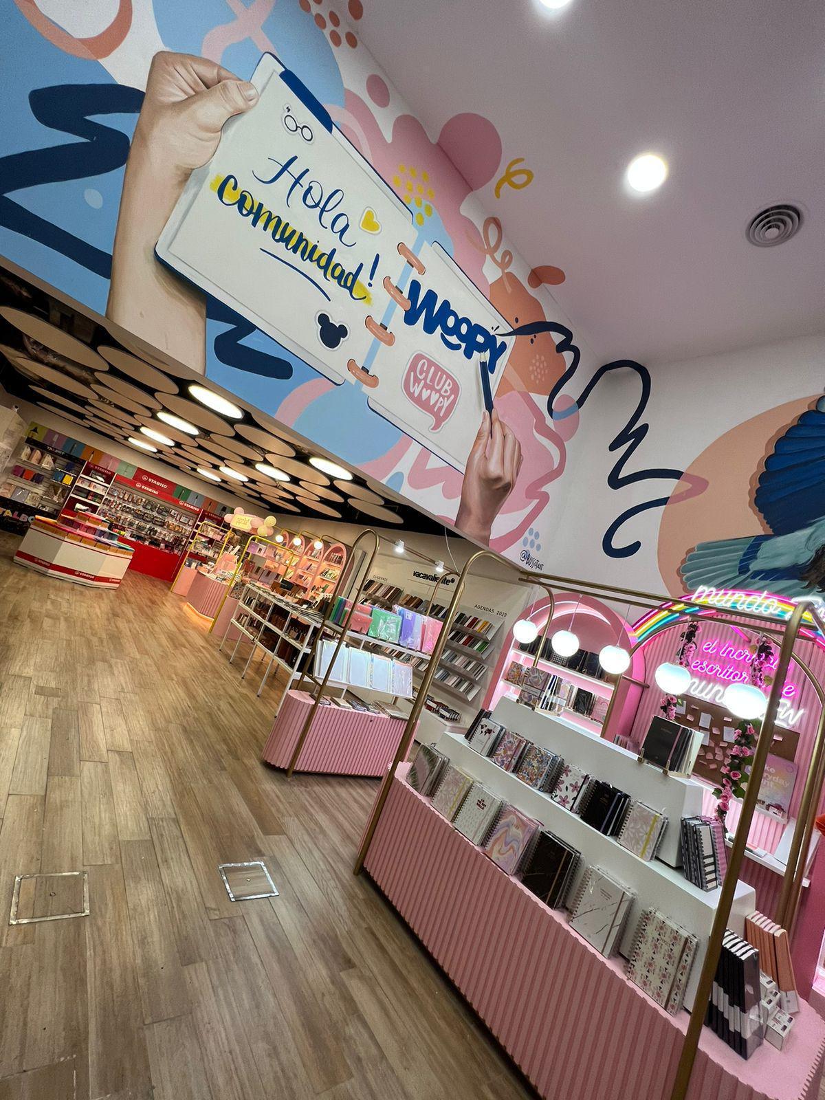 La artista detrás de la estética de Woopy: Juli Bussot, la muralista que transformó cajas, locales y emociones