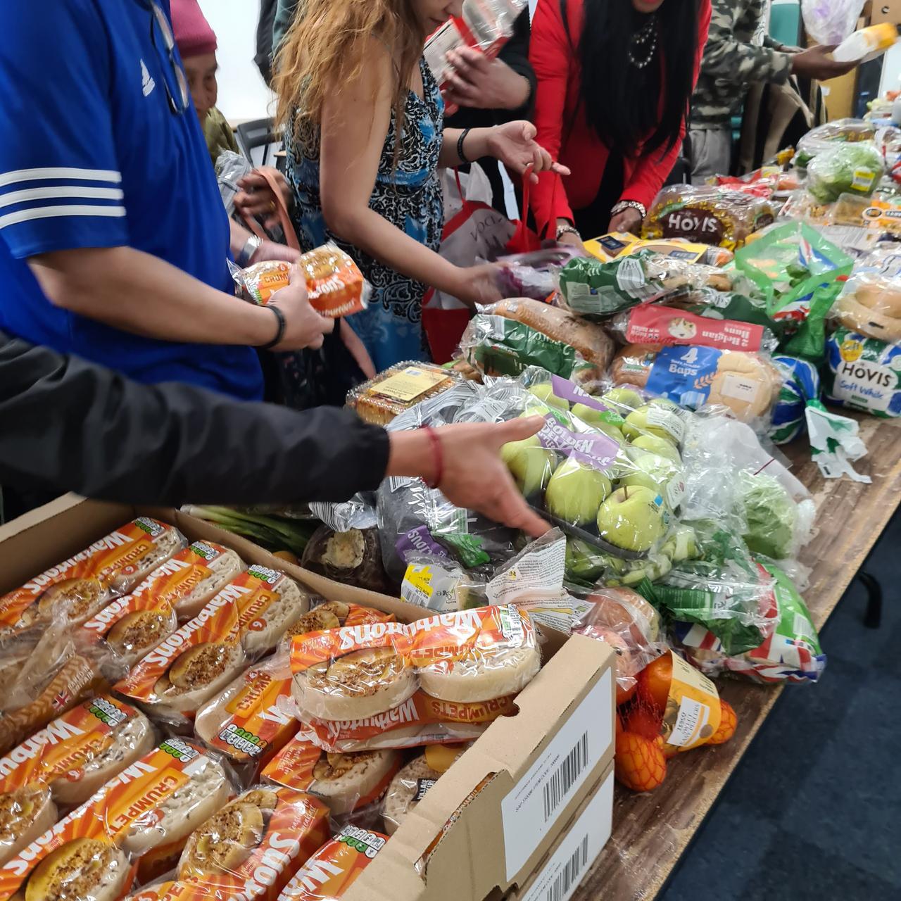 Volunteers help set up a community day