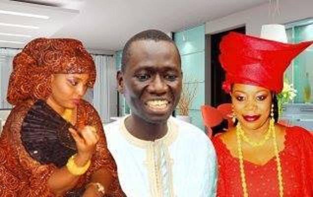 Serigne Mboup, le Président directeur de CCBM bien entouré par ses deux femmes.