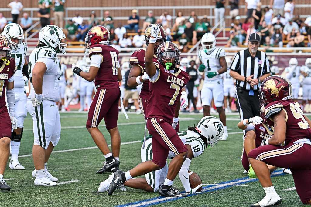 LIONS WIN A THRILLER OVER DEPAUL CATHOLIC, 21–18 LIONS WIN A THRILLER OVER DEPAUL CATHOLIC, 21–18
