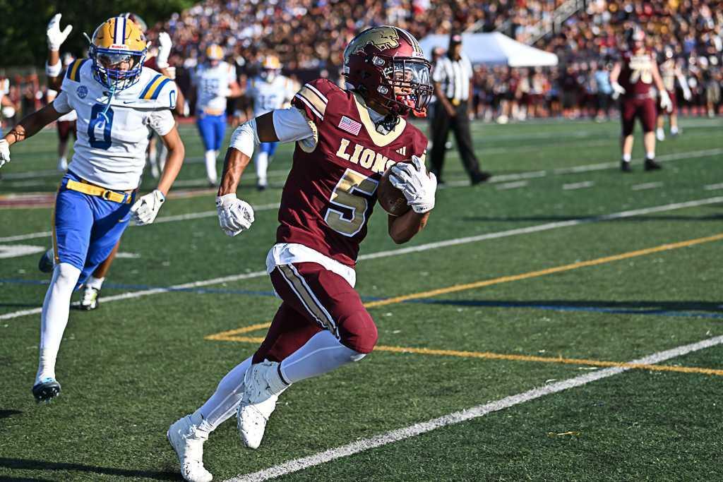 LIONS SHUT OUT ST. PETER’S, 38–0 LIONS SHUT OUT ST. PETER’S, 38–0