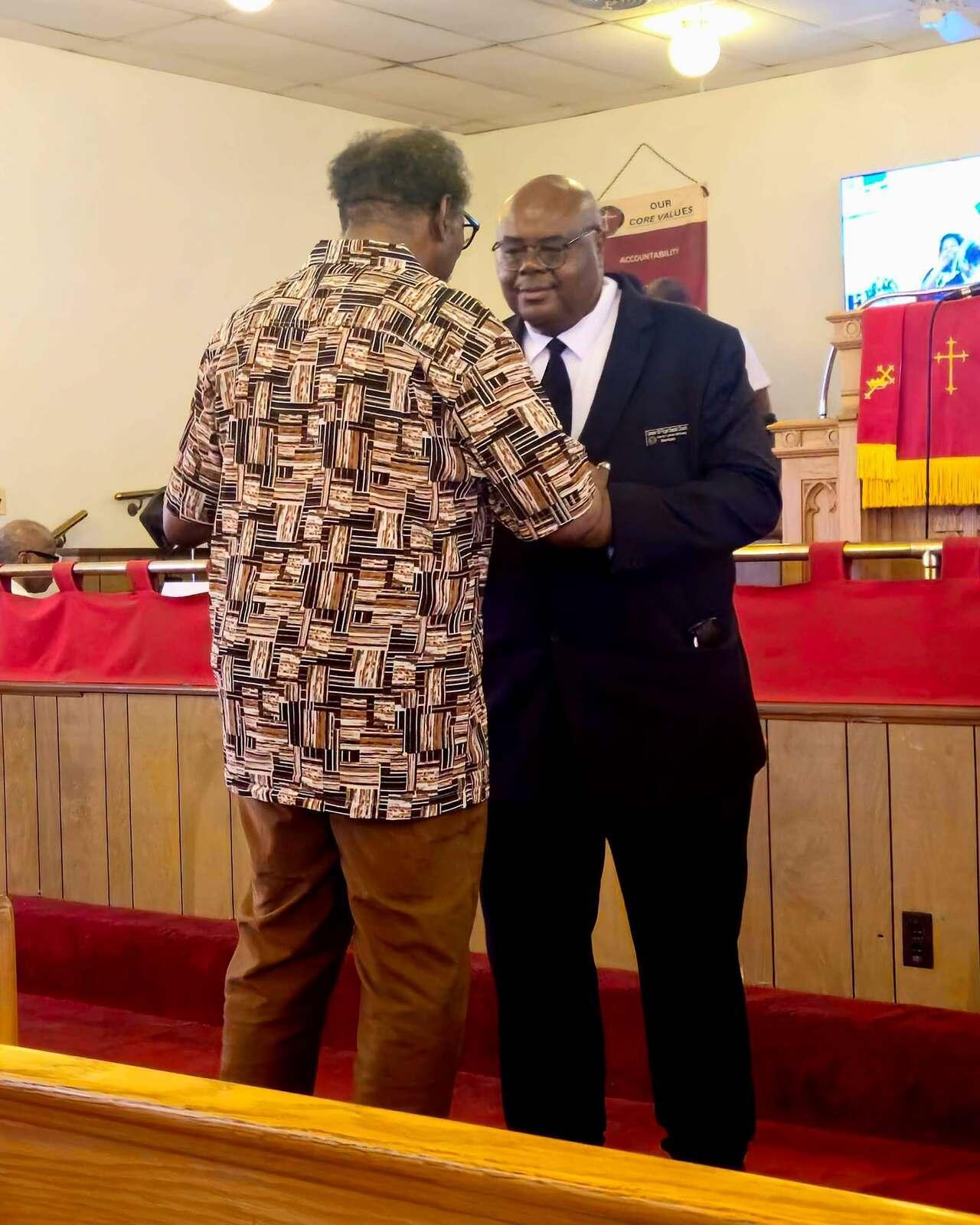 Brothers encouraging one another