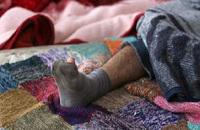 Sciences: Des chaussettes sales contre le palu