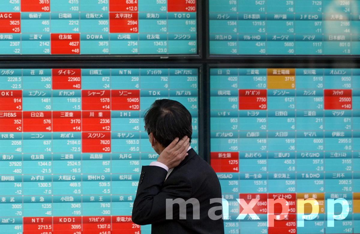 Tokyo stocks lower on possible state of emergency