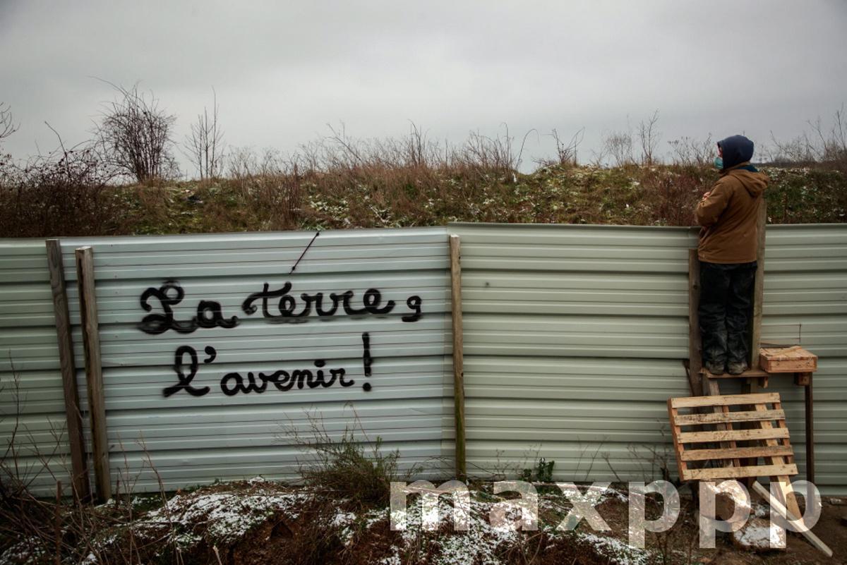 Environmental activists take action to block a Metro station project in Gonesse