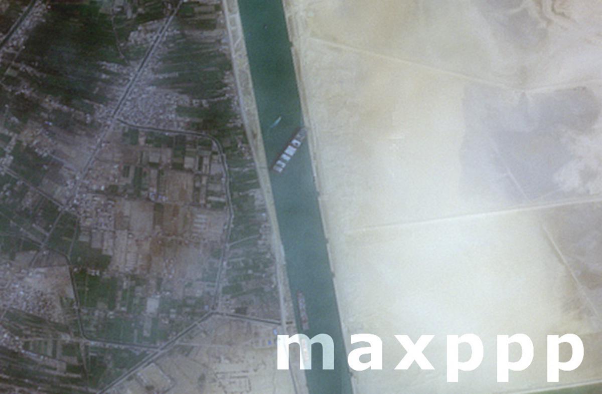 Suez Canal blocked as container ship runs aground
