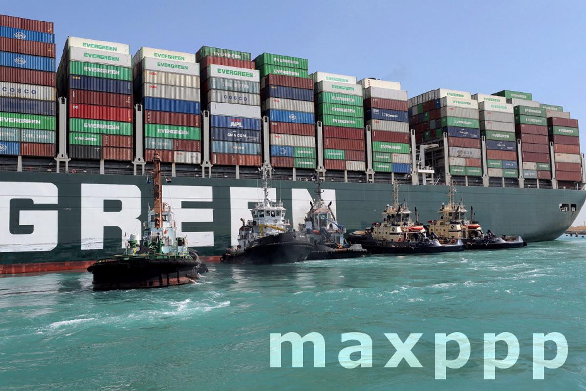Suez Canal blocked as container ship runs aground