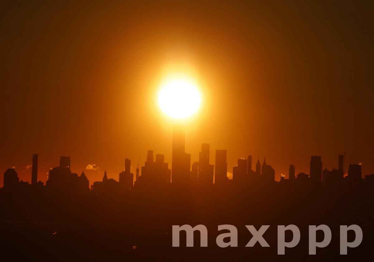 Sunrise Behind One World Trade Center and Manhattan Skyline