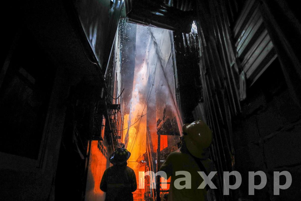 Fire destroys homes in a community in central Bangkok