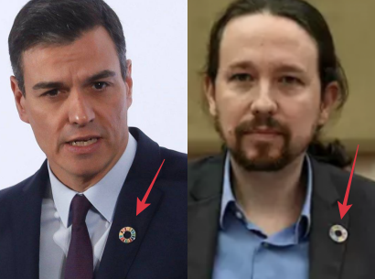 Luciendo el símbolo de la Agenda 2030, la que quiere sojuzgar a los humanos