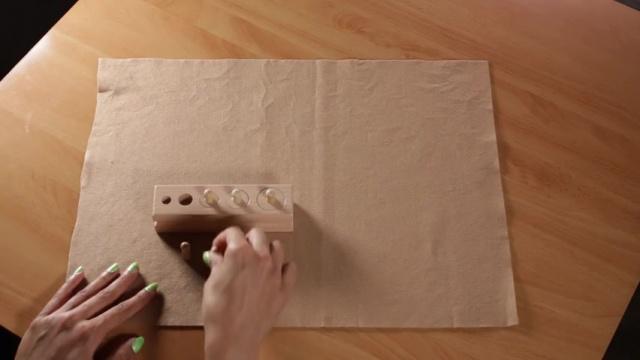 Sensorial Lesson 2 - Knobbed Cylinders Block 2