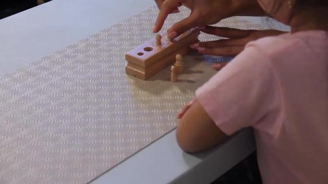 Sensorial Lesson 1 - Knobbed Cylinders Block 1