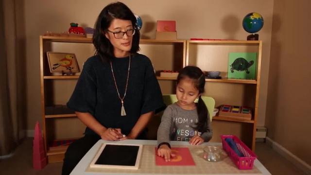 Writing Lesson 14 - letter g on blackboard