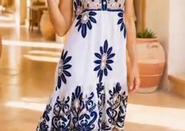 👗 Mouwloze print jurk 38-44